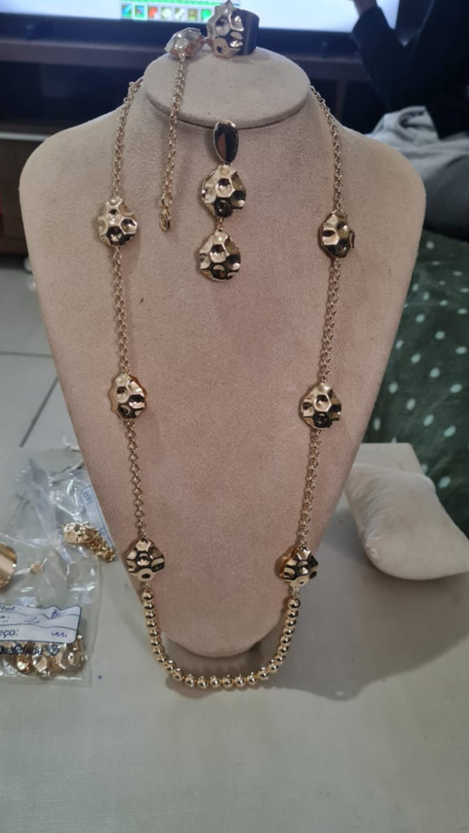of Brazilian earrings, necklaces, bracelets, and rings